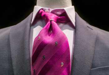 Grey jacket with magenta tie