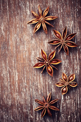 Star anise on rustic wooden surface