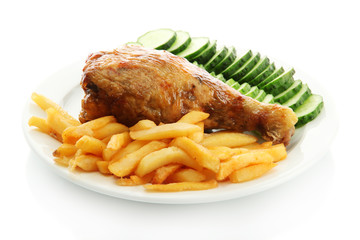 Roast chicken with french fries and cucumbers