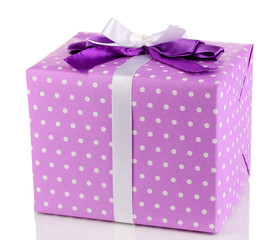 Colorful purple gift with bow isolated on white