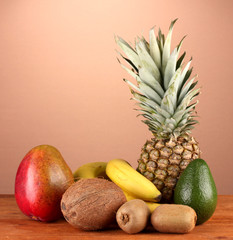 still life of fruit on a table on a brown background