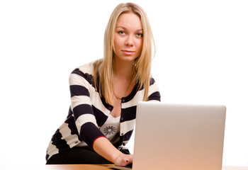 Naklejka premium Young woman with her laptop