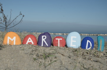 Obraz premium Martedì, second day of the week on colourful stones