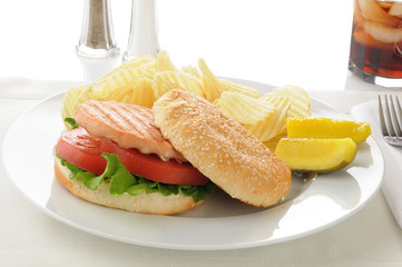 Salmon burger with chips