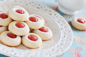 Homemade almond cookies filled with jam, selective focus