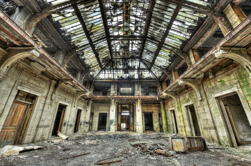 Beautiful glass roof inside the hall of an abandoned central off