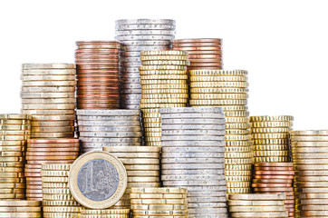 grouped stacks of EURO coins, isolated on white