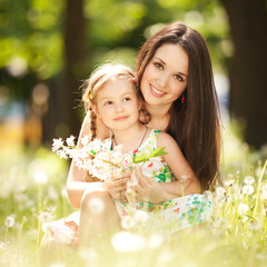 Mother and daughter in the park
