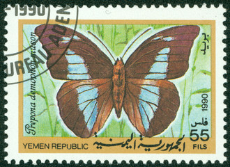 Fototapeta na wymiar stamp printed in Yemen Republic shows Prepona demophon muson