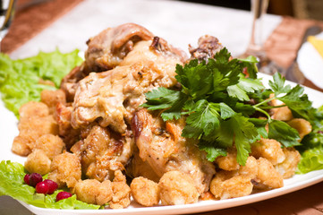 Roasted rabbit and vegetable garnish