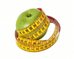Measuring tape and apple
