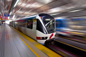 Fast LRT train in motion, Kuala Lumpur - obrazy, fototapety, plakaty