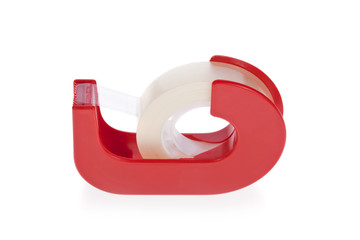 Clear tape dispenser isolated on a white background.
