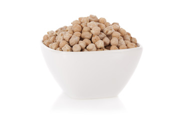 White chickpeas in a bowl isolated on a white background