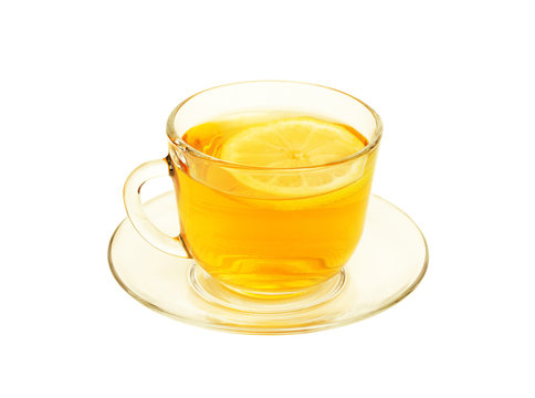 Tea in glass cup on saucer with  lemon isolated on  white