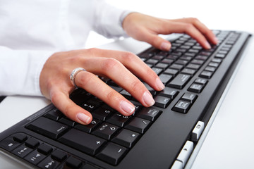 Hand with a computer mouse.