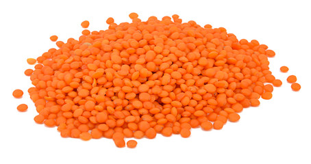 Heap of red lentils isolated on white background