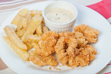 chicken and fries with cheese dip