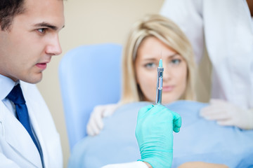 Fototapeta premium Dentist and anesthetize