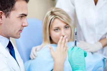 Naklejka premium Terrified patient at the dentist