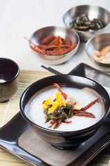 congee with dried beef, peanuts, preserve turnips and sea weeds