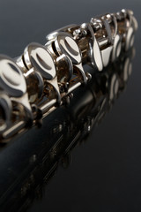 Detail of flute on a black background, with copy space © rgvc