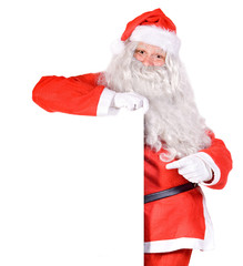 Santa Claus holding a blank sign isolated