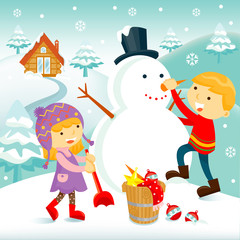 Fototapeta na wymiar Children building a snowman