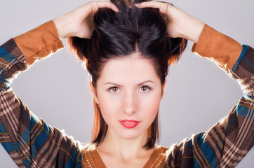 Fototapeta premium Рortrait of young beautiful woman of brunette