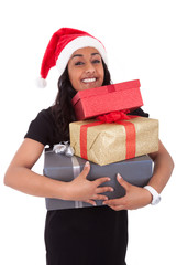 Young African American woman holding gift boxes