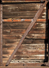 Fototapeta na wymiar Stare kolejowe brązowy drewniany wagon jako tło strony
