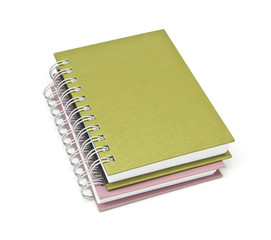 stack of ring binder book or brown notebook