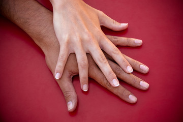 Fototapeta premium Hands of a Couple in Love