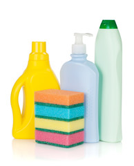 Plastic bottles of cleaning products and sponges