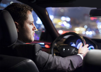 businessman driving car
