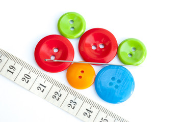 Multi-colored buttons and garment inch needle