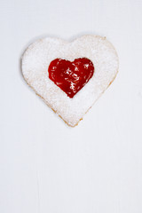 linzer homemade cookie with heart shape raspberry jam window