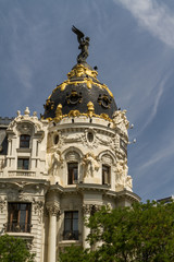 Obraz premium Metropolis building facade located at Madrid, Spain