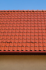 red roof with blue sky