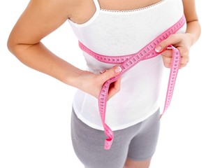Woman measuring breast