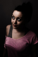 Beautiful girl in the darkness