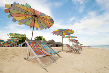 Beach chair and colorful umbrella on the beach , Phuket Thailand