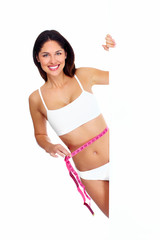 Beautiful healthy woman with a measuring tape.