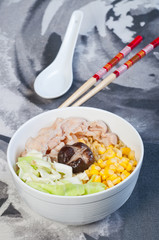 sliced pork with vegetables and buttered corn ramen
