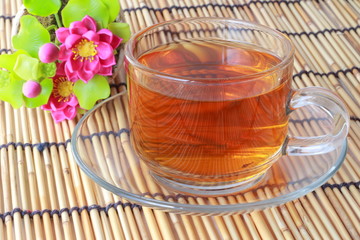 Tea cup with pink flowers