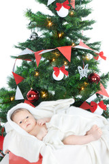 Newborn baby in a present box