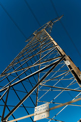 high voltage electrical towers in line