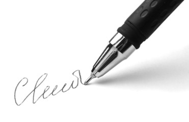 Closeup of signature (fake, not real) and pen, isolated on