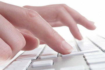 female hands touching computer keyboard