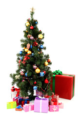 Decorated Christmas tree with gifts isolated on white